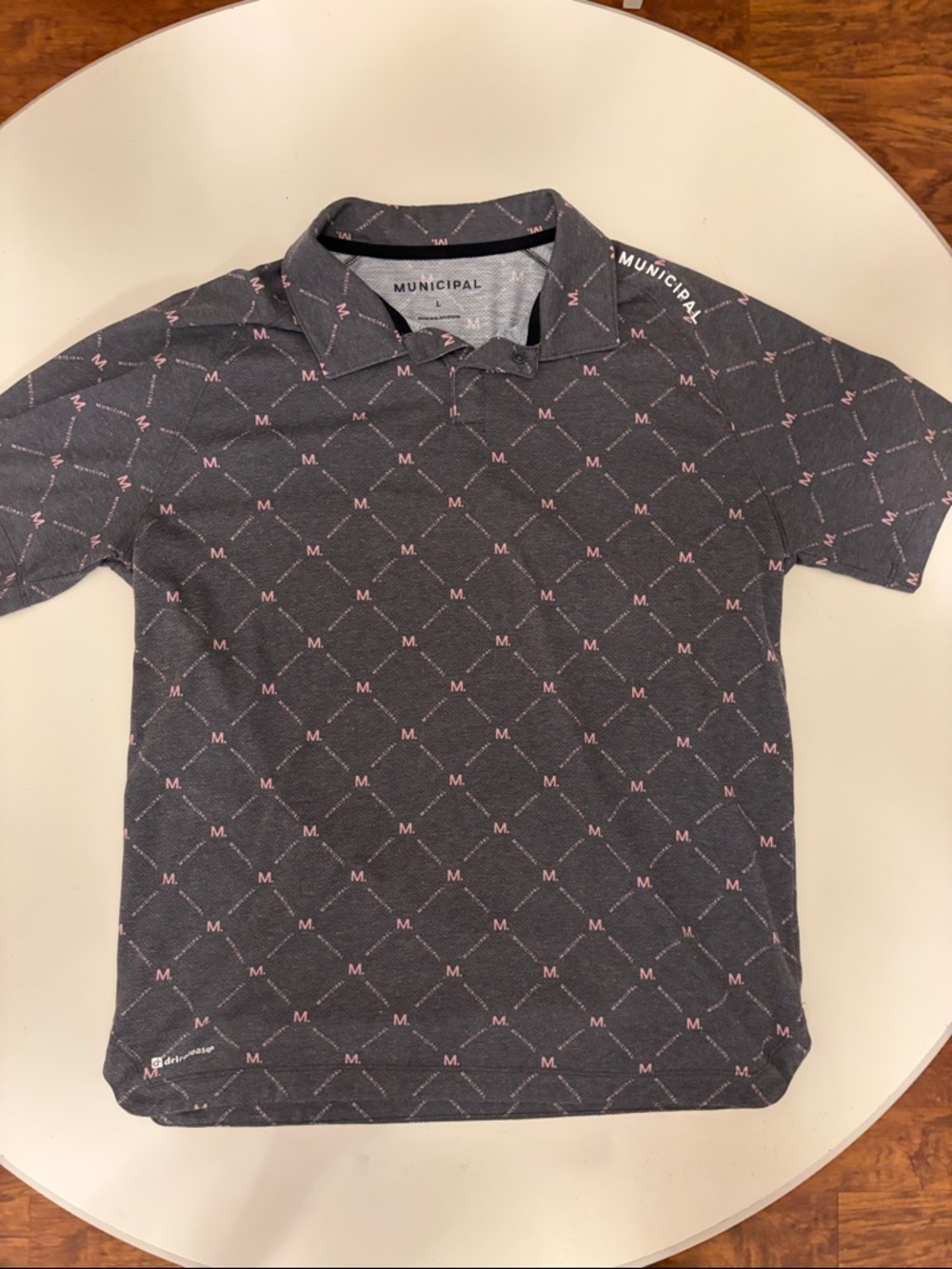 Municipal Men’s polo with Waste Management Phoenix Open logo on sleeve